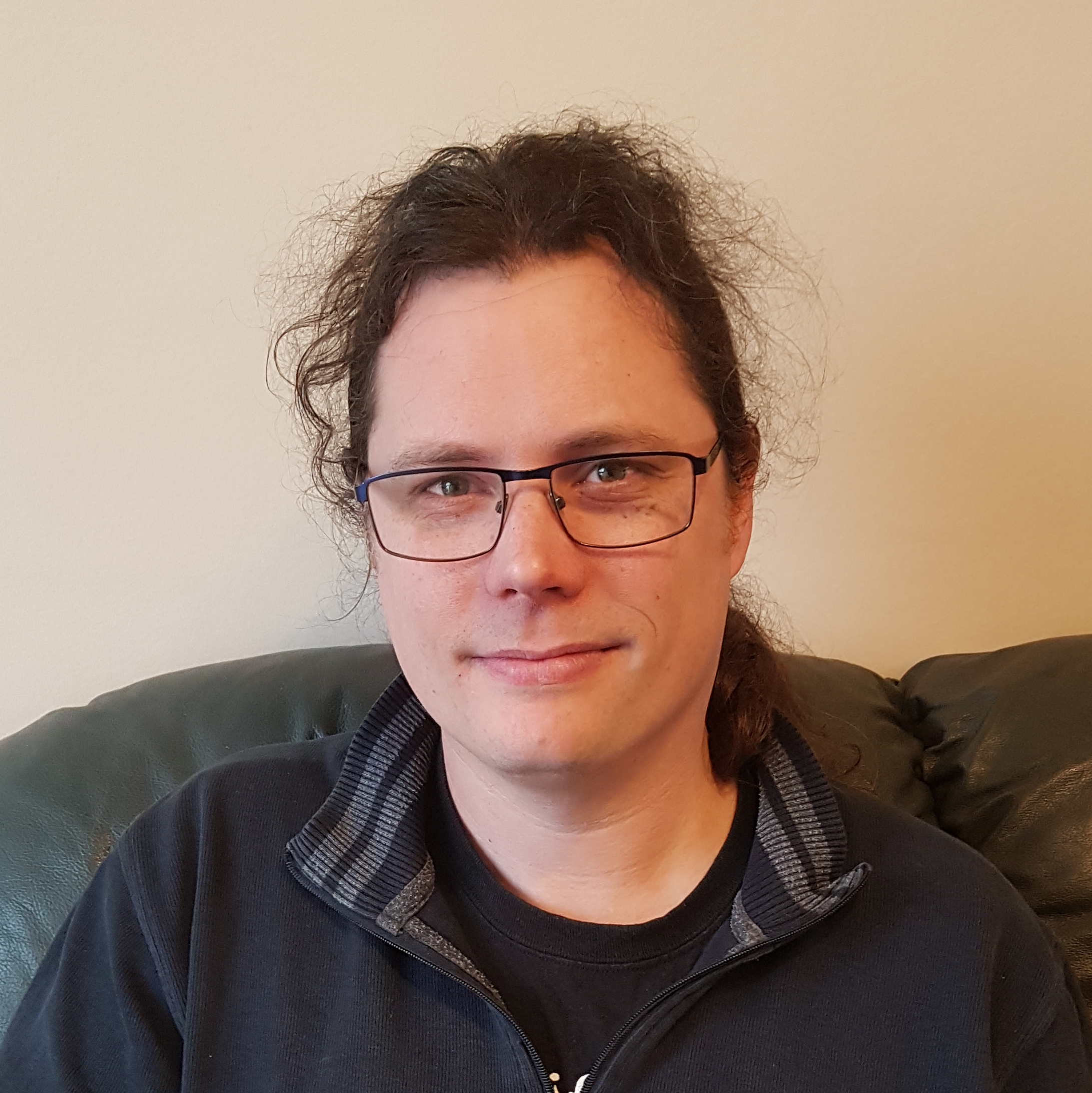 Portrait of Dr Ewan Clark