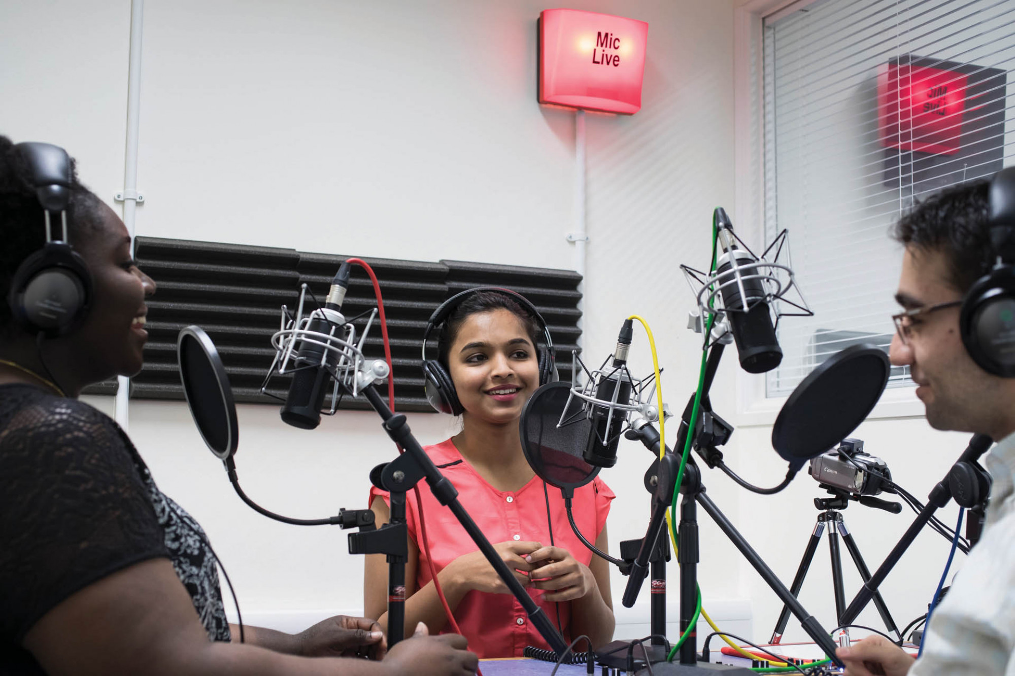 Three students recording for the student radio