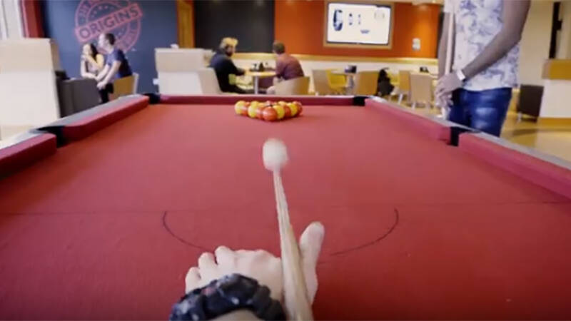Student's point-of-view playing pool