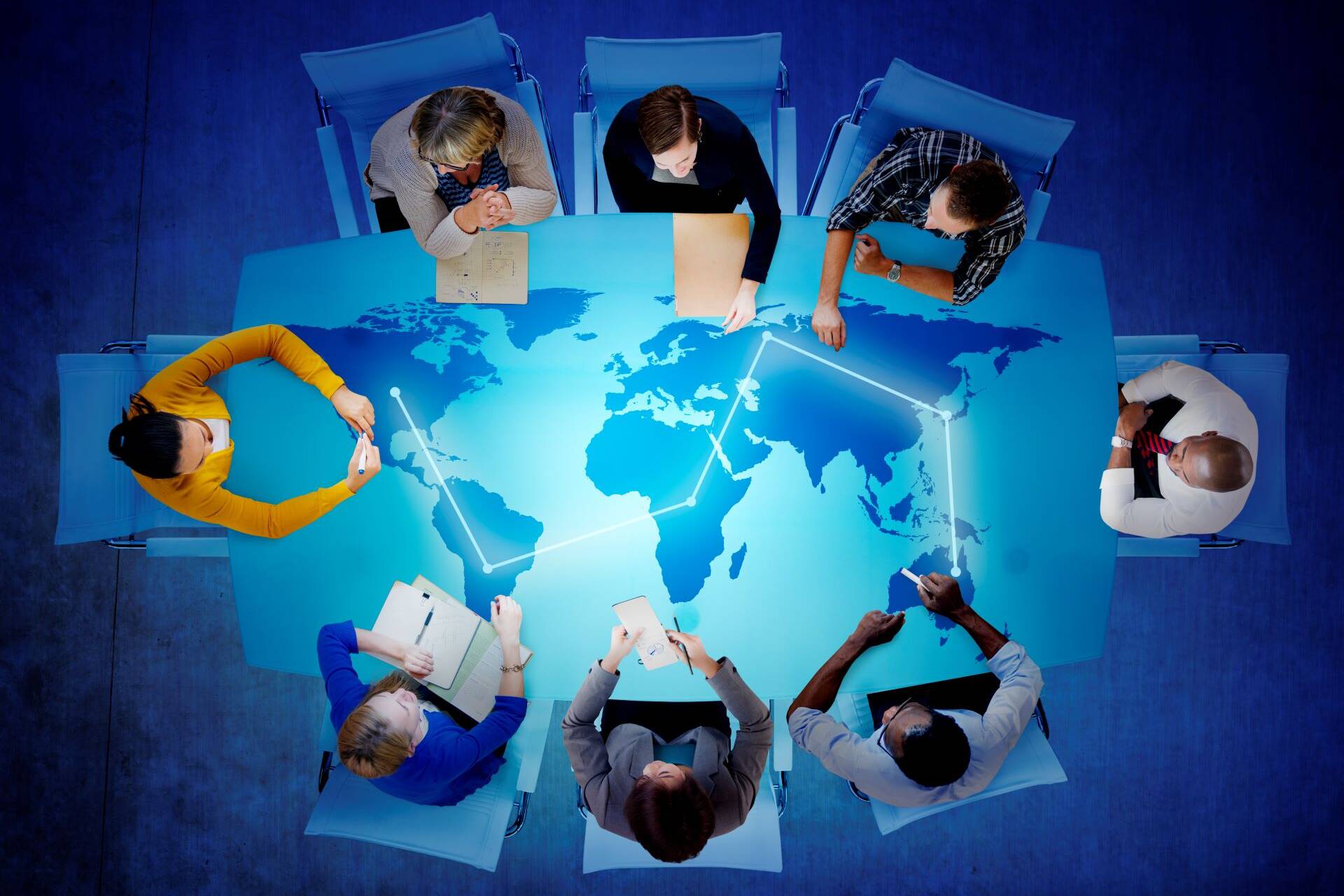 Illustrative image of group of multi-ethnic people discussing global issues