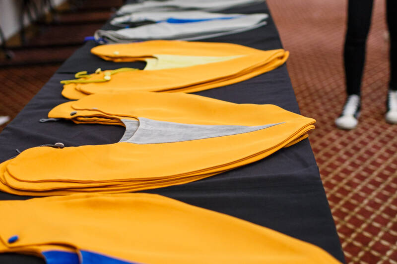 Image of University of Kent hoods lined up on a table at the ceremony.