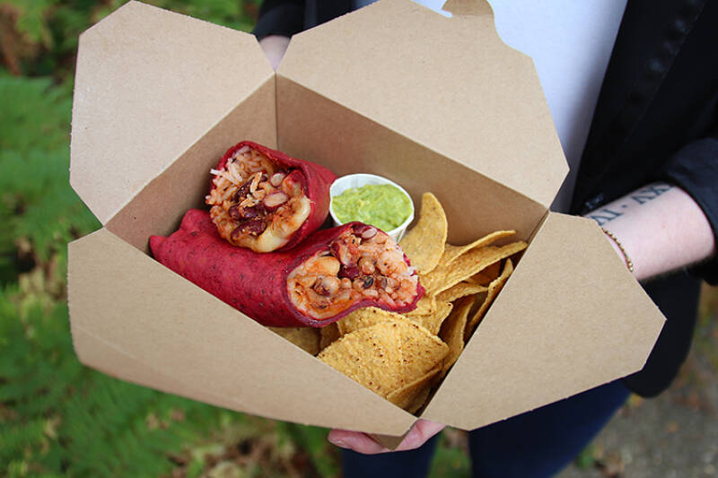 Burrito and tortilla chips served in takeaway box from The Street Kitchen