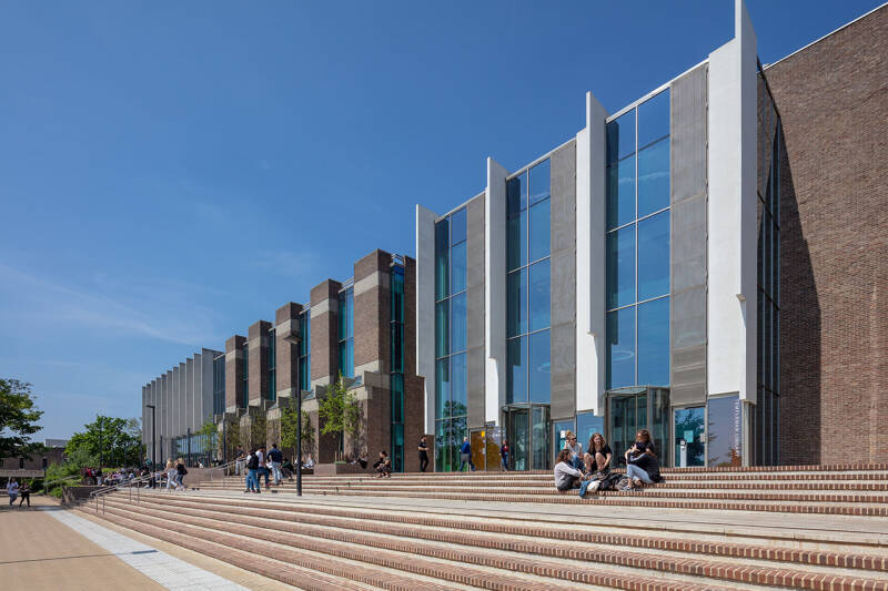 Templeman Library Main Entrance has a large glass fronted atrium and a wide staircase and ramp leading up to the door