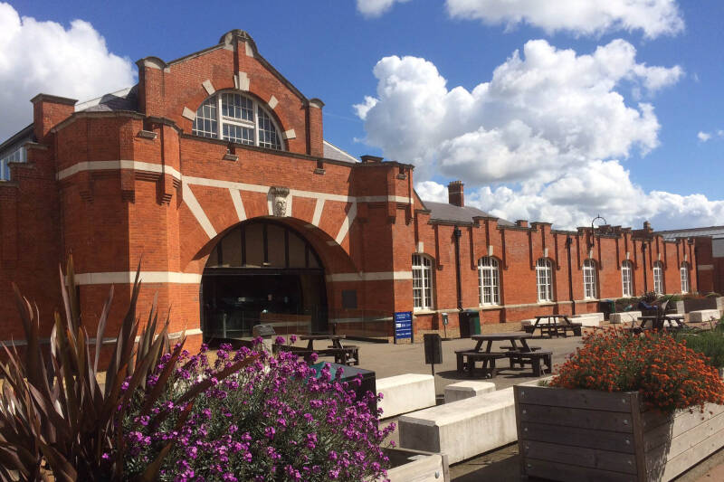 Drill Hall Library is a long, mostly single-storey red brick building