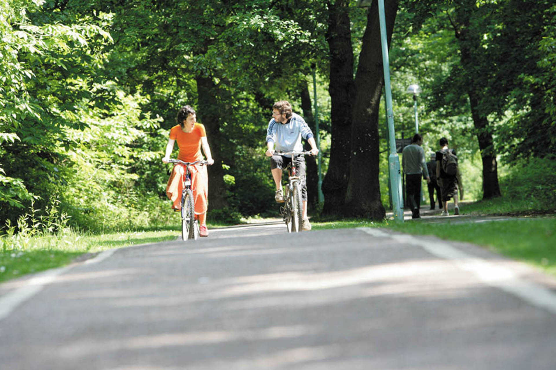 Students cycling on campus