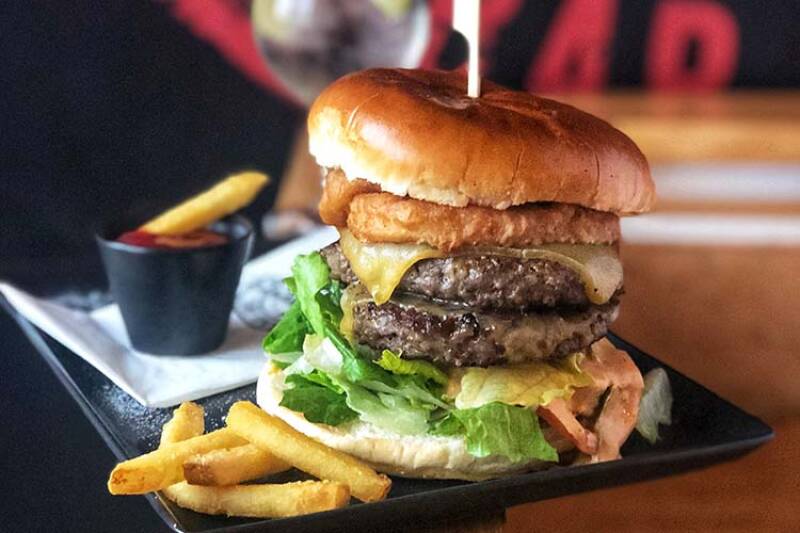 Closeup of Yosemite Sam burger from Origins