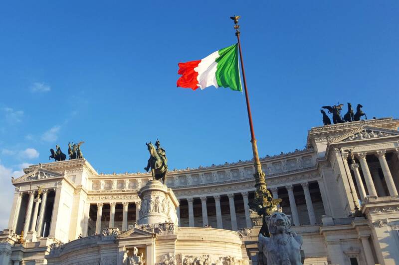 The Italian flag flying in the Piazza Venezia, Rome