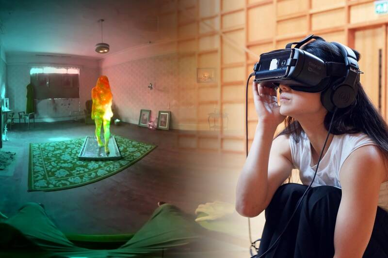 Female wearing VR headset, hologram in background