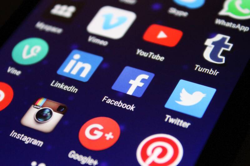 Phone screen with social media icons