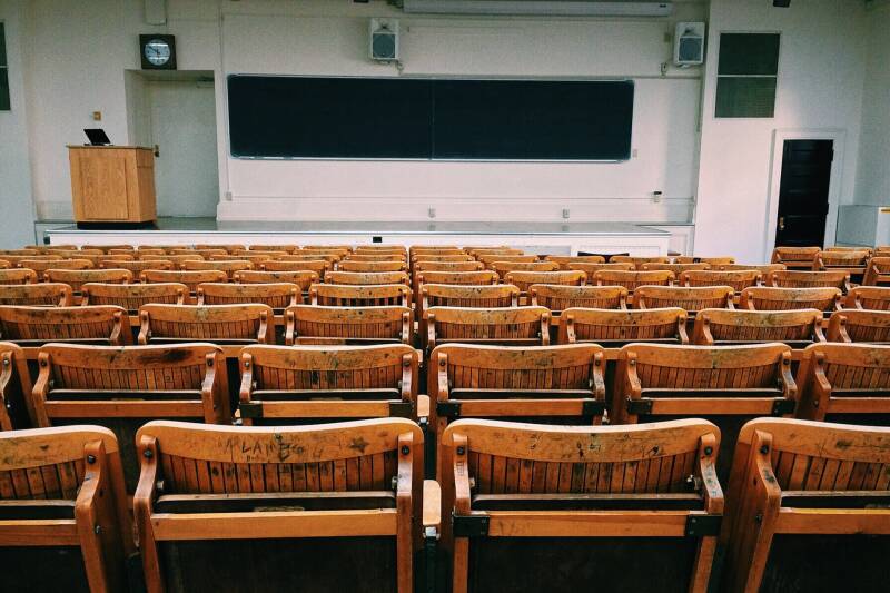 lecture theatre with wooden seats