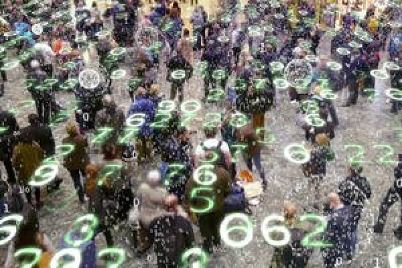 crowded street with digitally added numbers/equations hovering above them