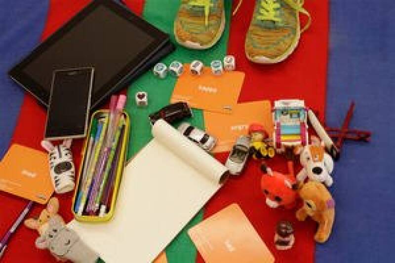 Desk with toys and young persons stationary