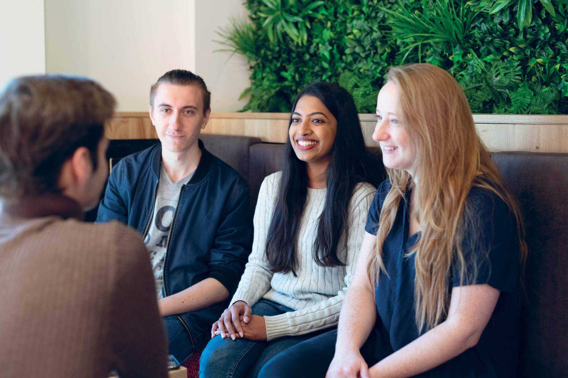 Four students sitting together