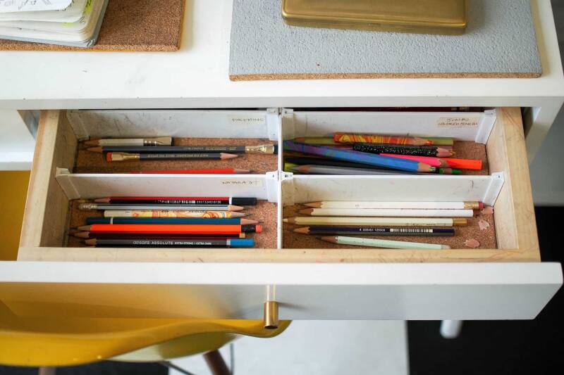 a drawer full of pencils