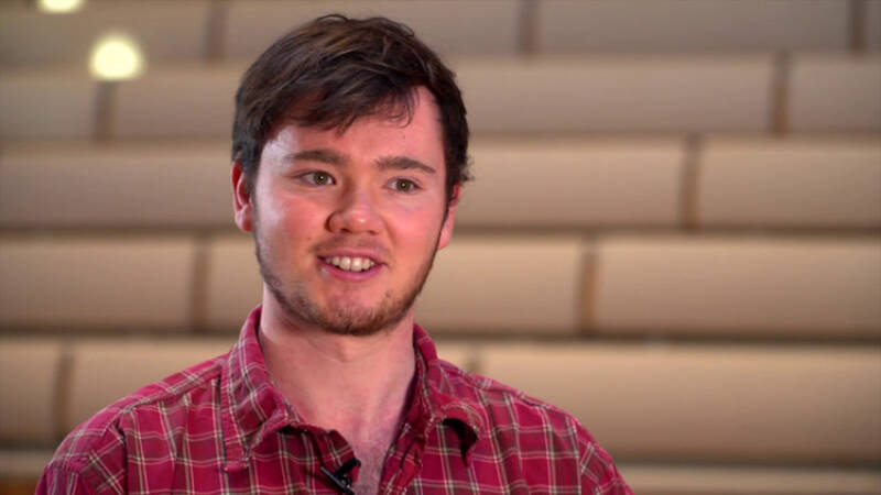 Music scholar sitting in the Colyer Fergusson hall