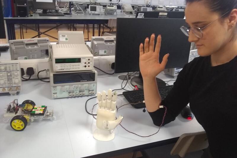 Biomedical Engineering student with hand