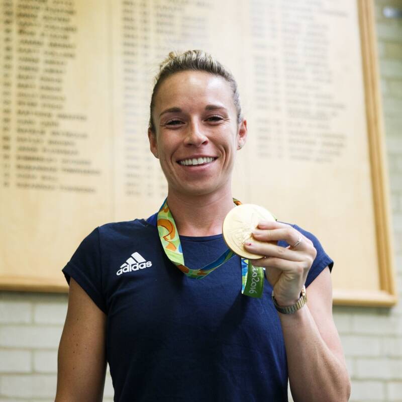 Susannah Townsend, stood with a gold medal in the Sports Centre (Canterbury)