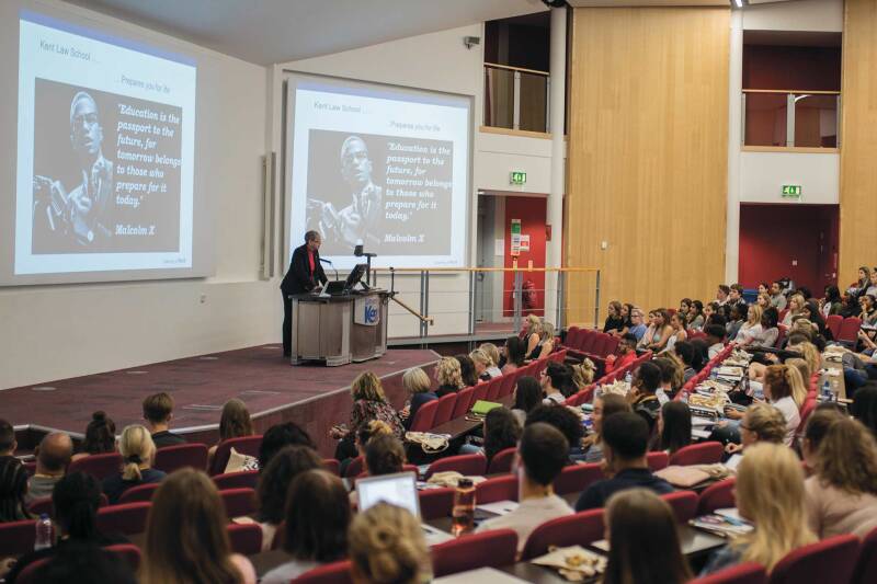 Professor Toni Williams delivering a lecture in Woolf