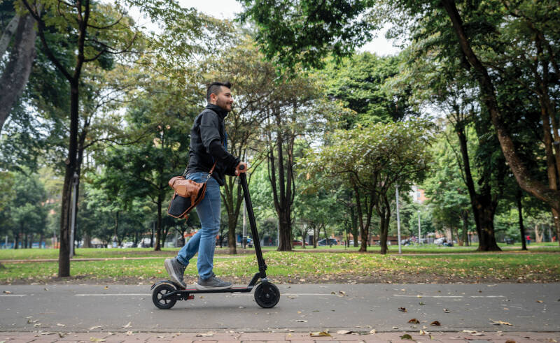 man on e-scooter