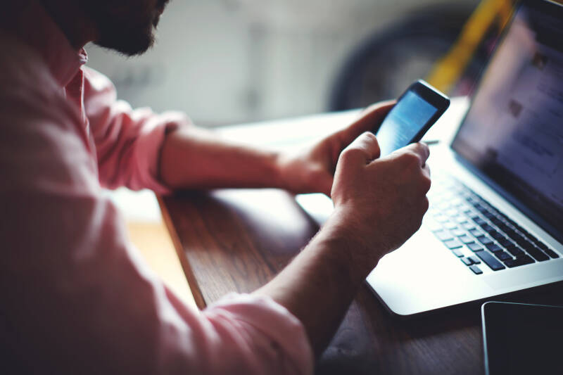 Person using laptop to book