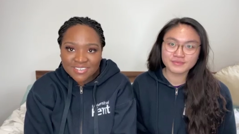 Two smiling female students