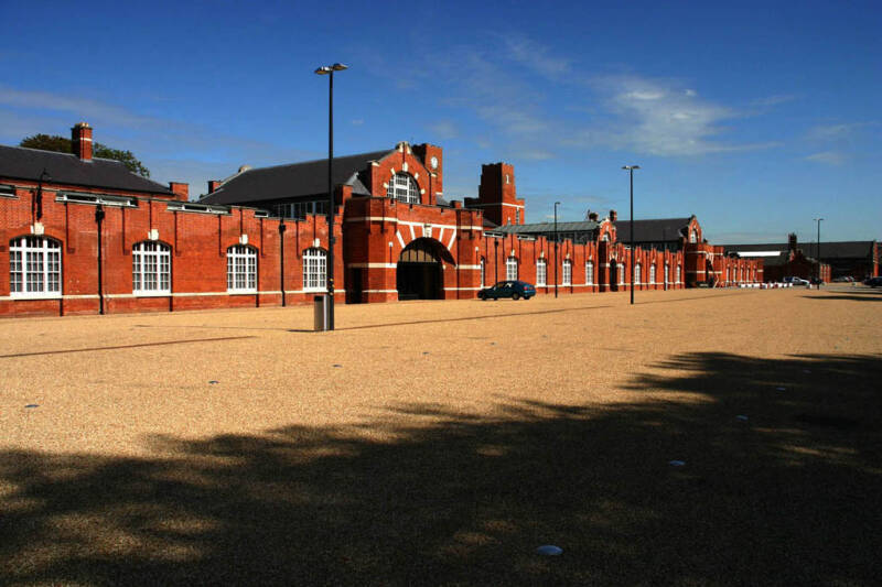The Library is a long red brick mostly single storey building