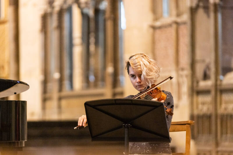 Female viola player in the Cathedral