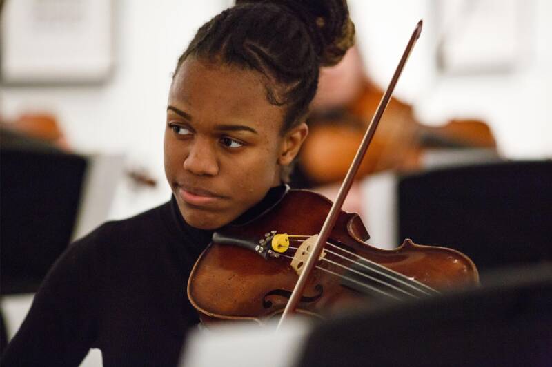 Melody Brooks, playing the violin