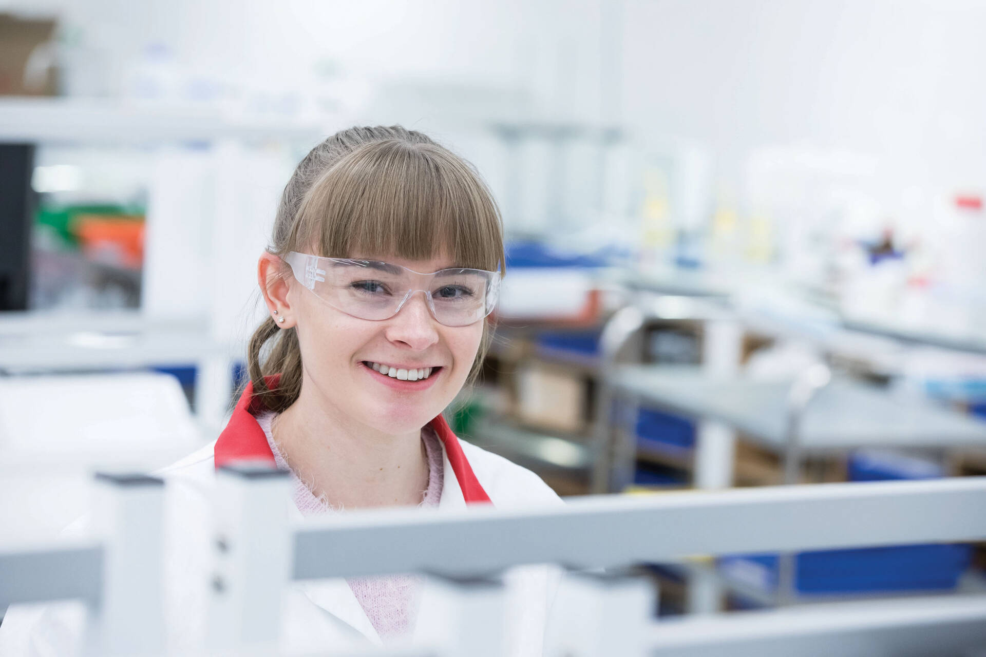 Smiling student in a lab
