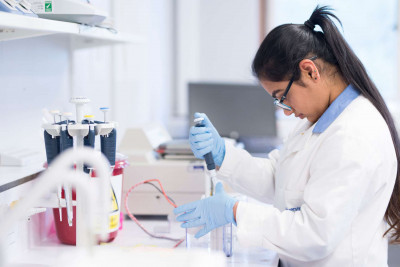 Female student loading protein samples