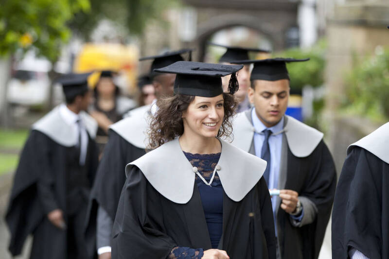 Students in graduation gowns