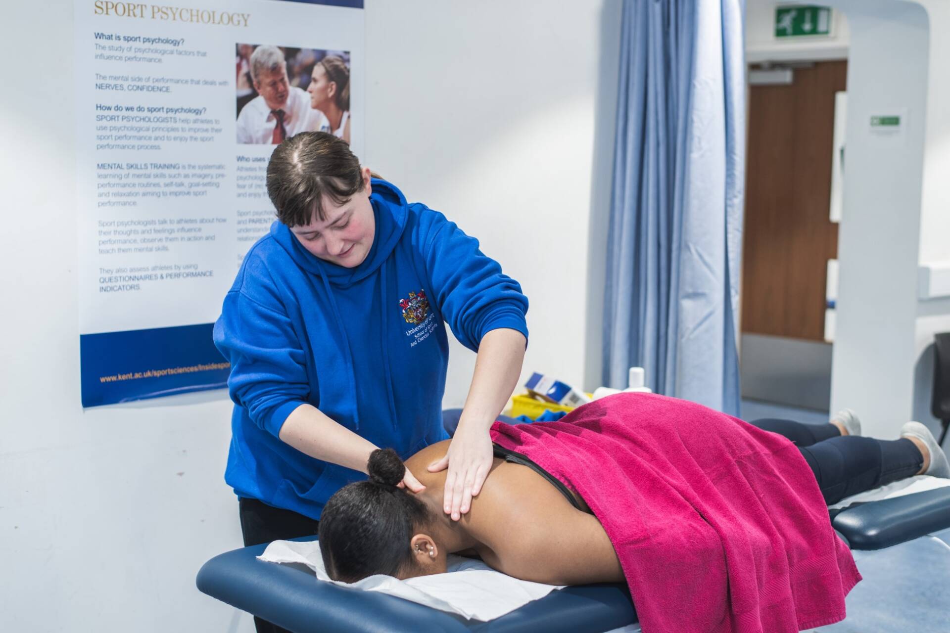 Student massage therapist working with a client during a massage appointment
