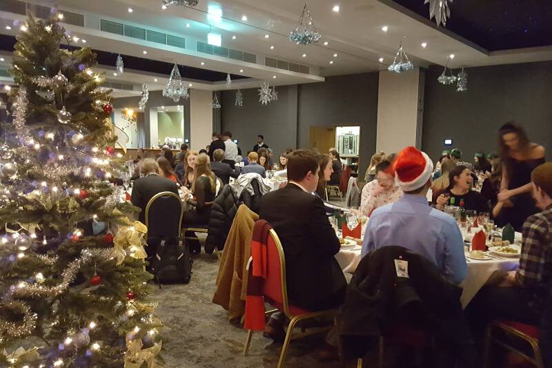 All suites set up for a department Christmas party in banquet layout