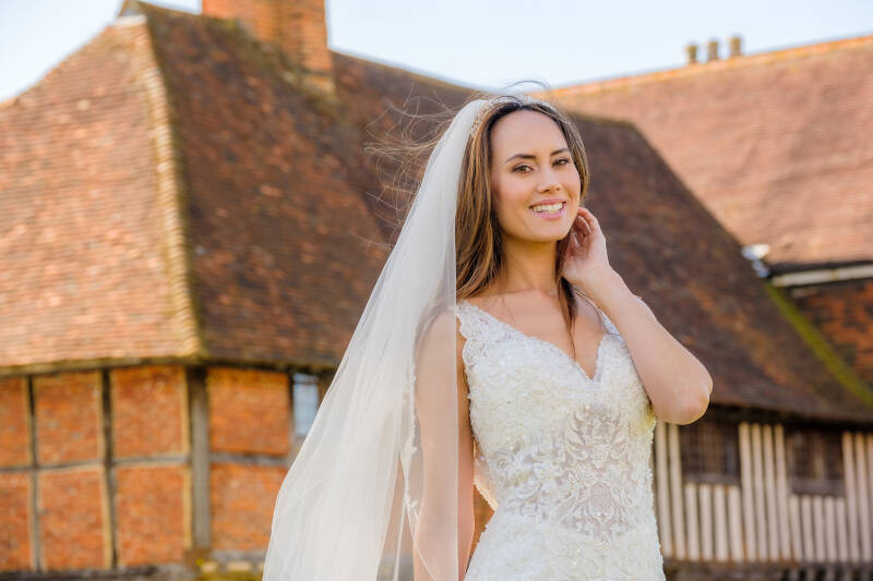 Bride in front of Beverley Farmhouse