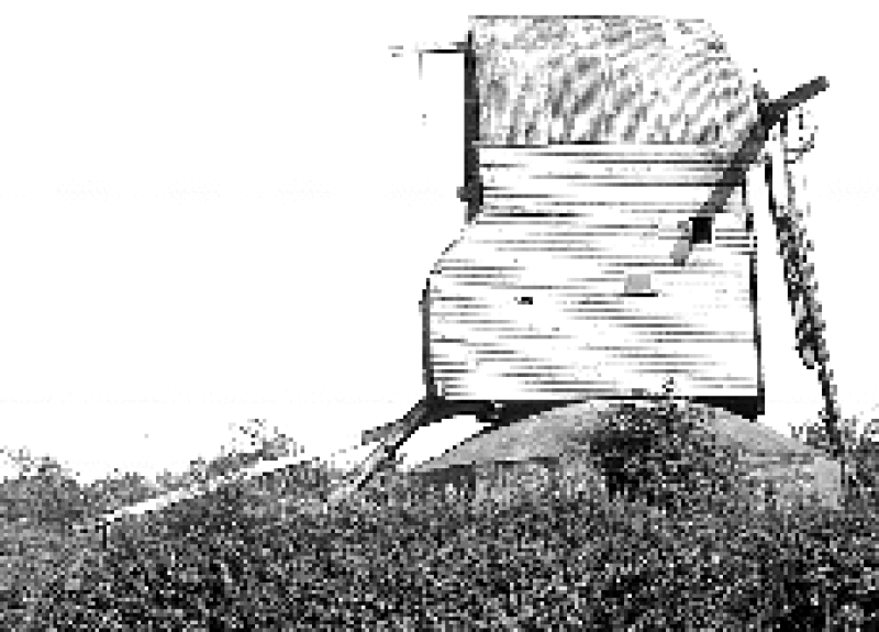 Black and white photograph of Chinnor post mill taken from the side.