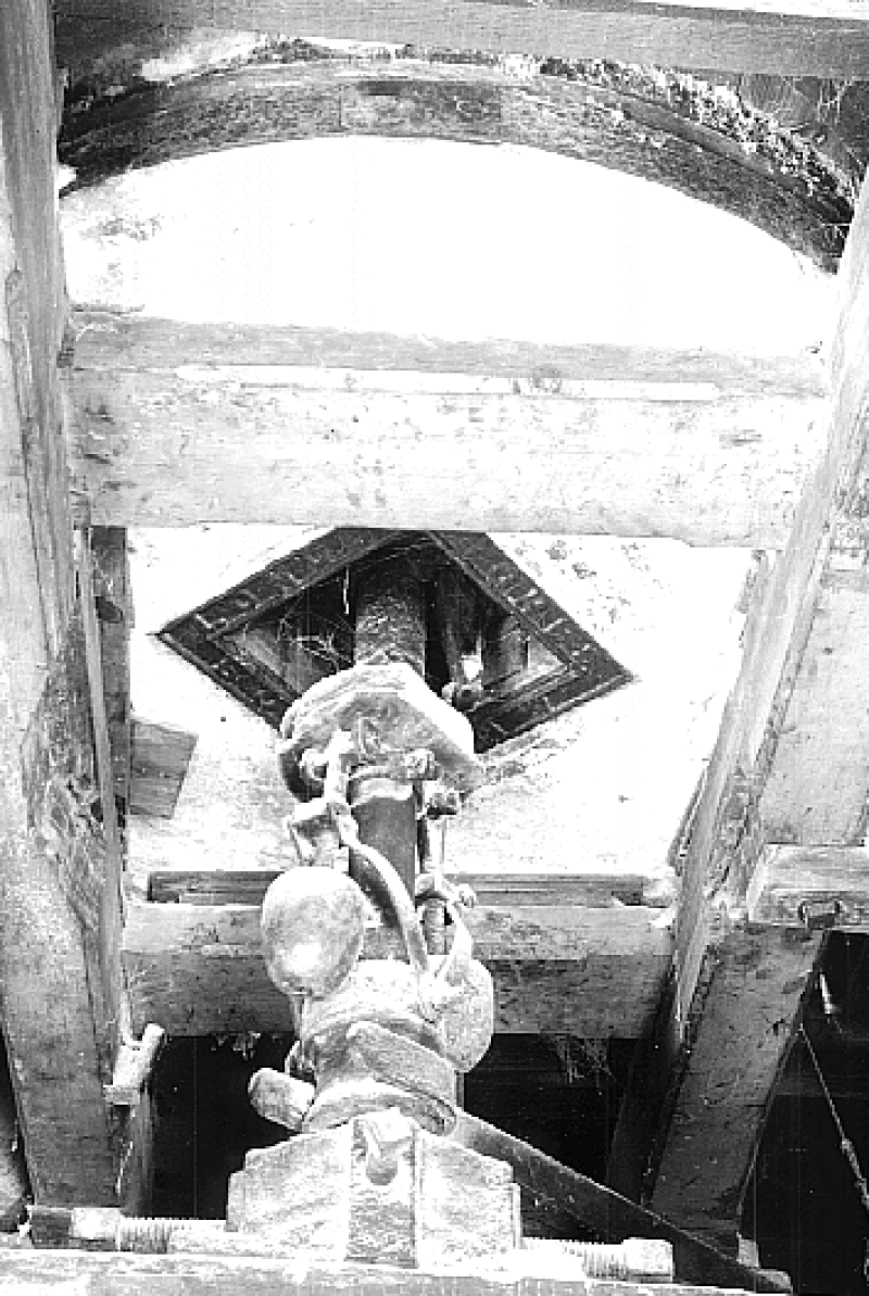 Photograph of interior view of the mill at Parham, Suffolk, showing bedstone and governors.