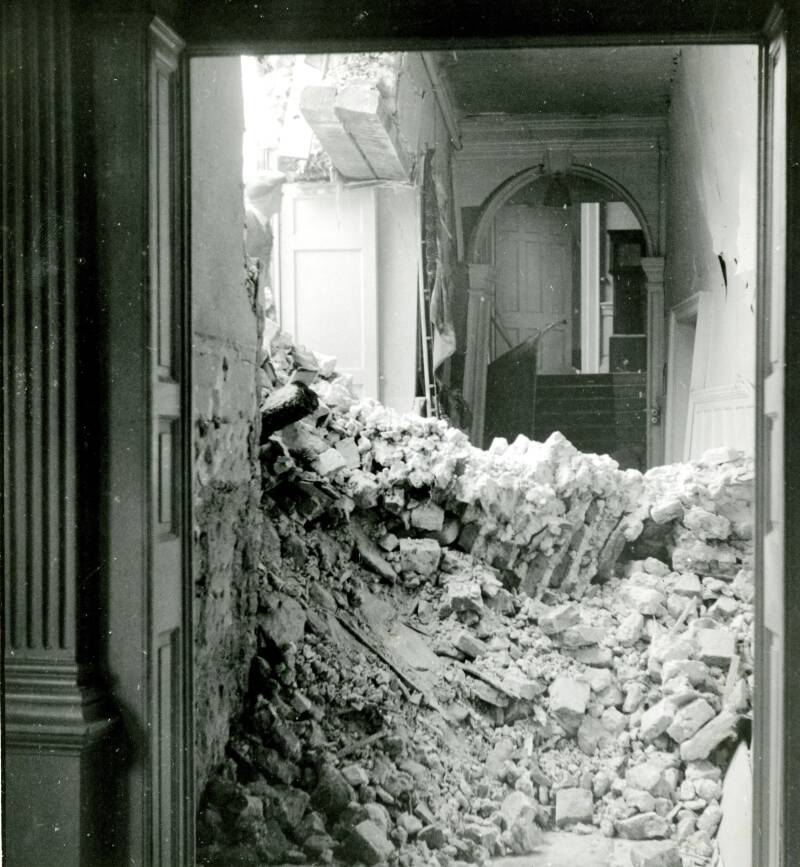 Photograph showing bomb damage to the inside of the Deanery, 1940