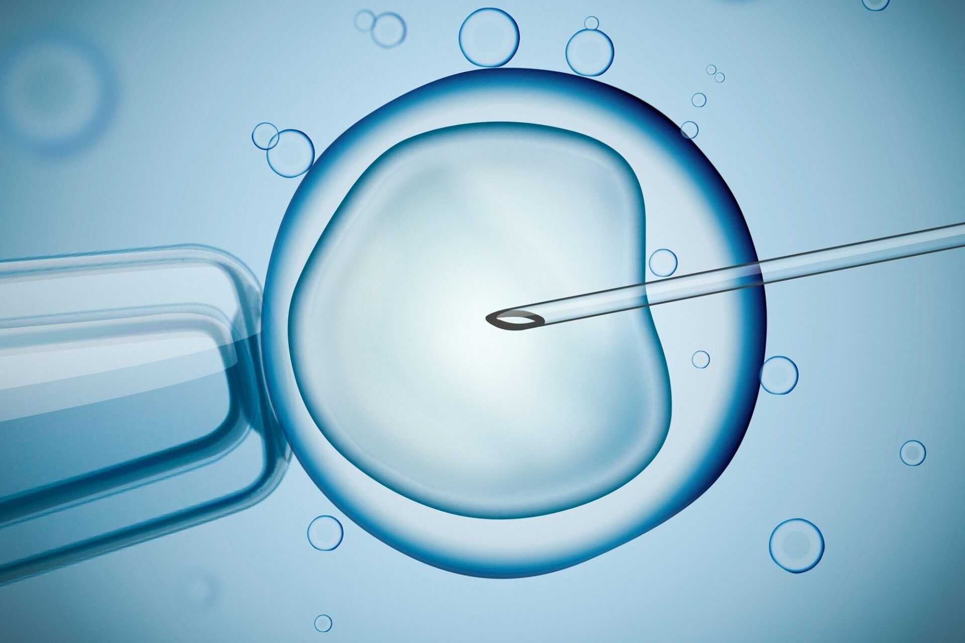 Light blue image of a needle piercing a cell