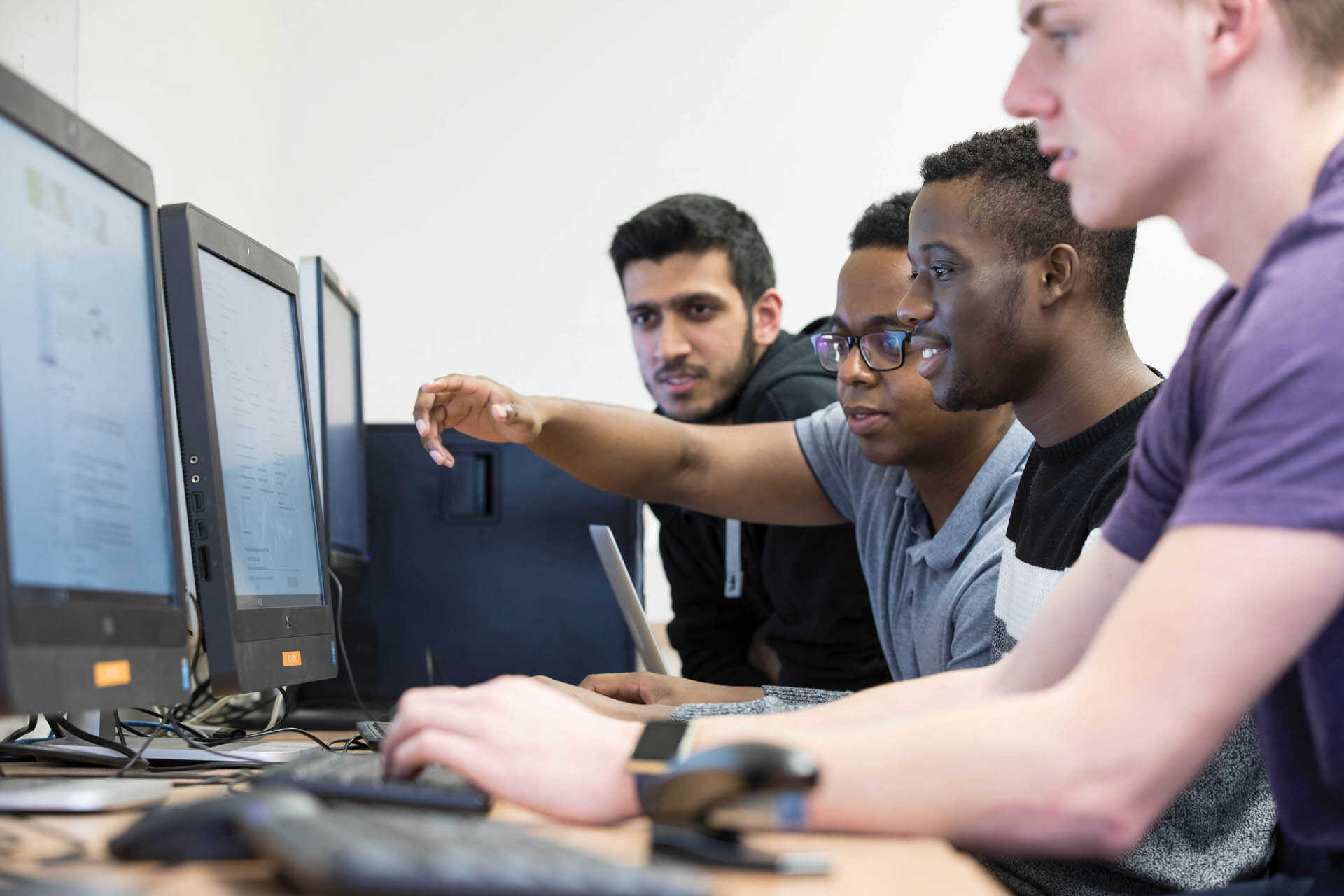 Group of students working at computer