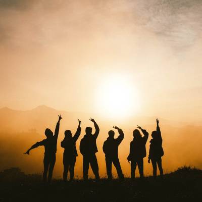 Group of friends in sunlight. Image by Chang Duong, Unsplash