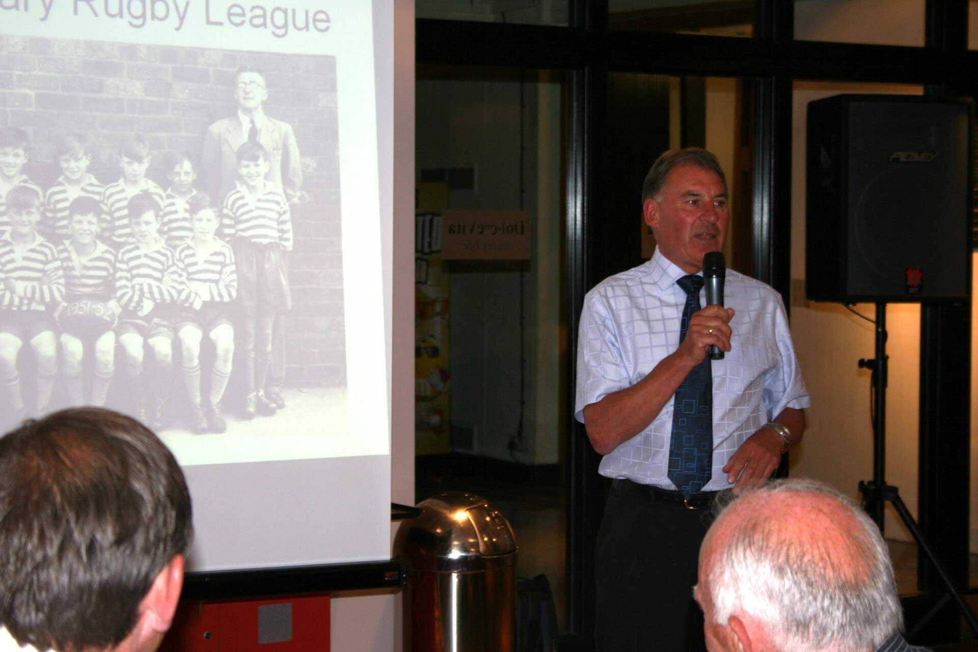 Mike speaking at the football dinner in 2007