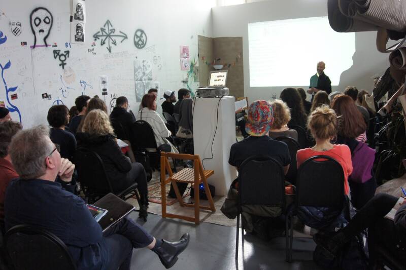 Artist Heath Bunting giving a talk in the Studio 3 gallery