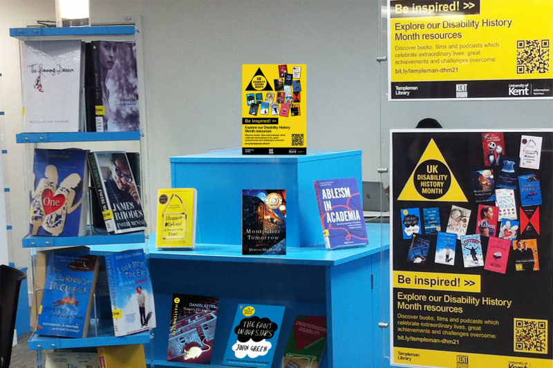 Blue book display stands and a poster stand