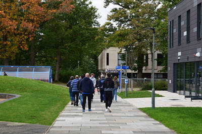 Students walking towards Jennison building