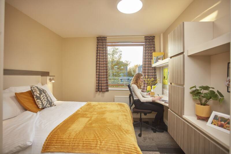 Park Wood Flat bedroom with student working at desk