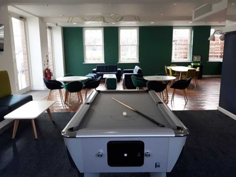Pool table and seating in Oasis Lounge.