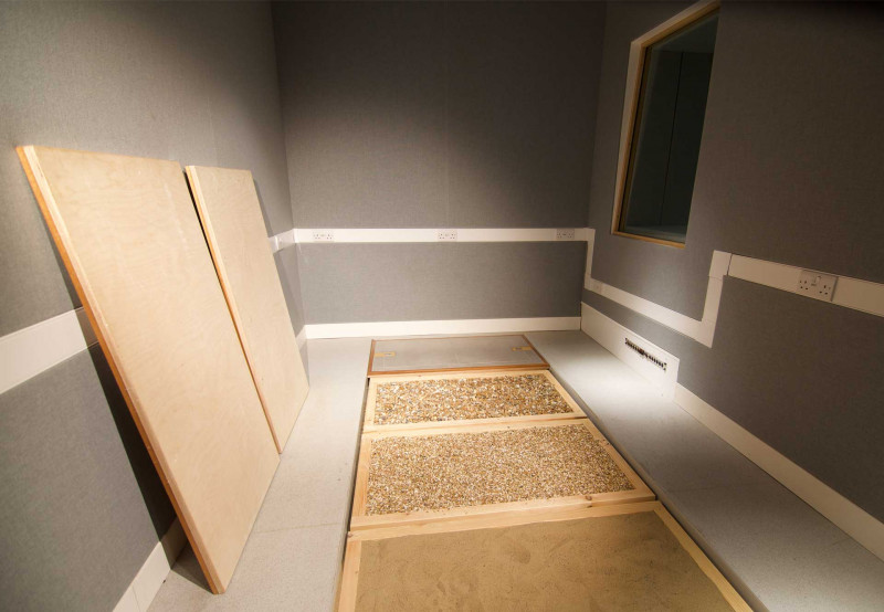 Studio room with a range of floor surfaces for sound effects.