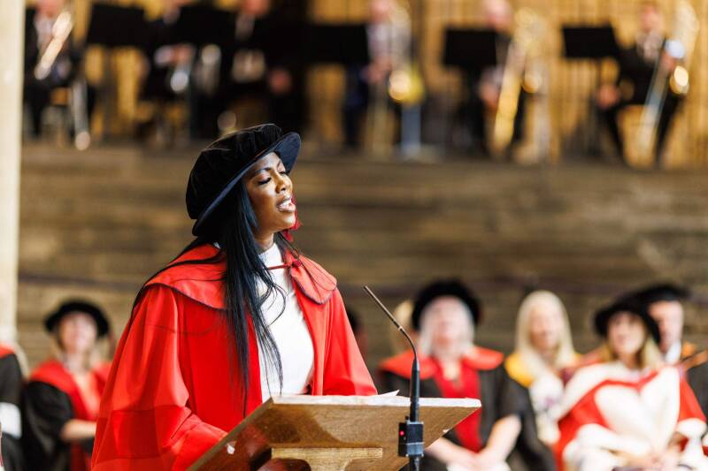 Tiwa Savage, singing at her honorary degree conferral