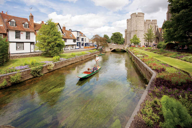 A river tour on the Stour with Westgate Towers in the background