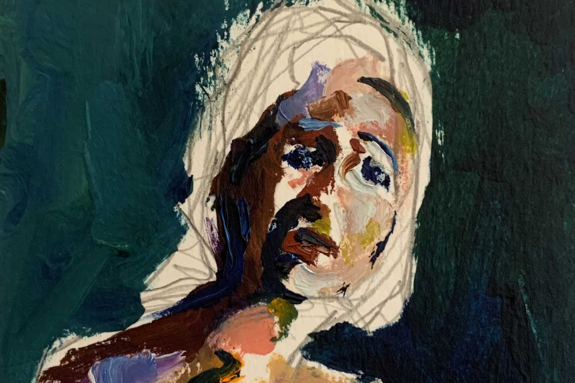 A portrait of a woman against a dark background